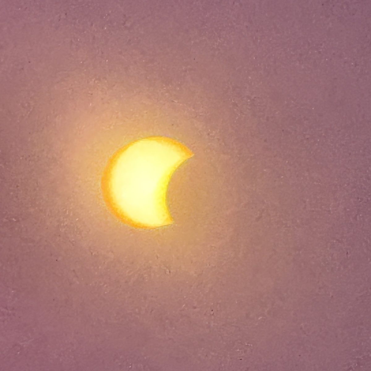 The Moon beginning to cover more of the Sun above A Coruña